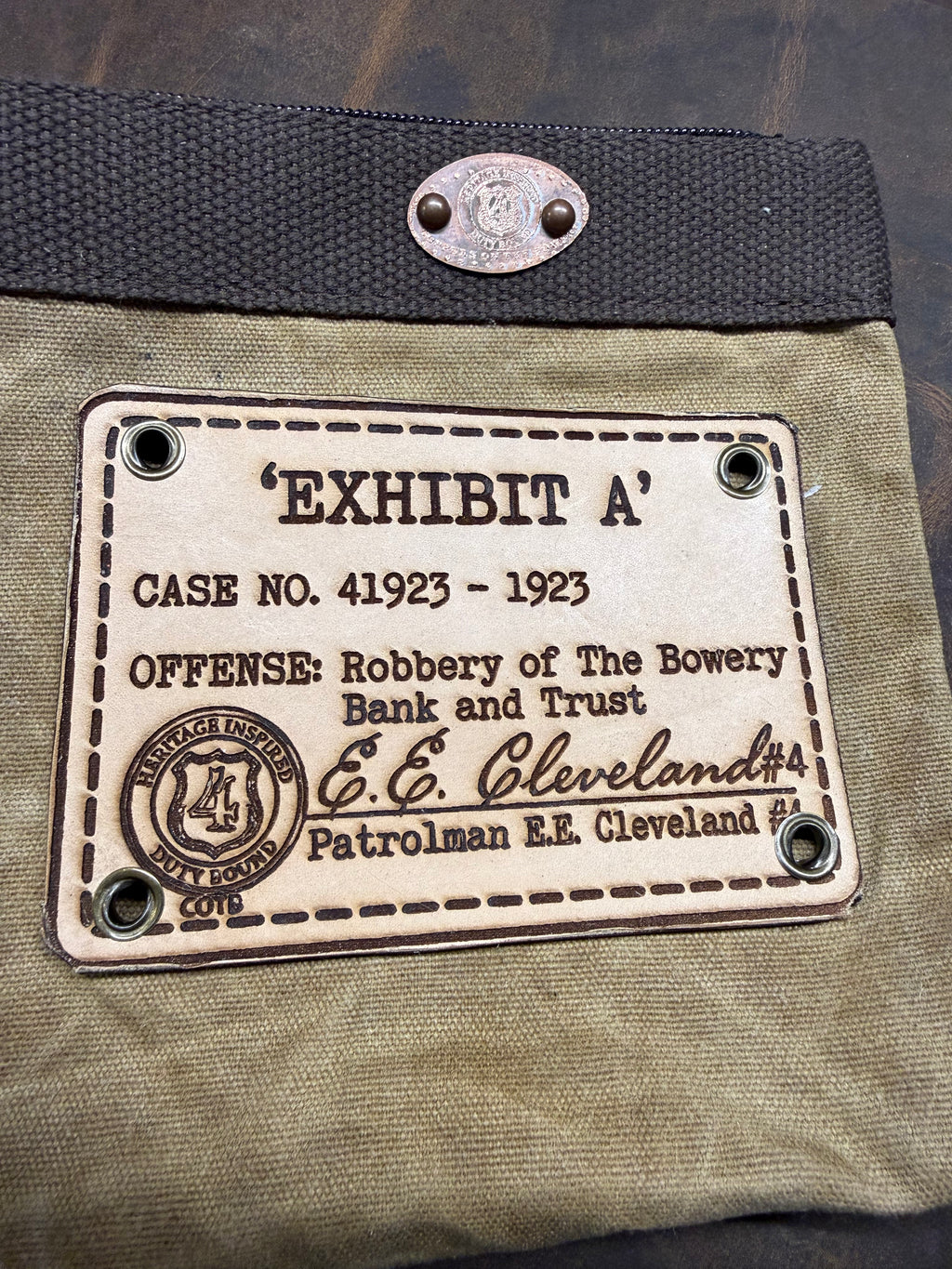 EXHIBIT A - The "Evidence Tag": Waxed Canvas Utility Bag